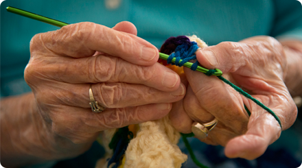 Woman with Osteoarthritis knitting Woman with Osteoarthritis knitting